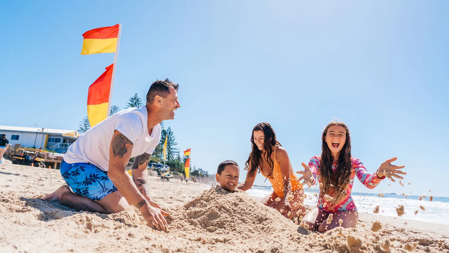 Fun in the sand at Alexandra Headland