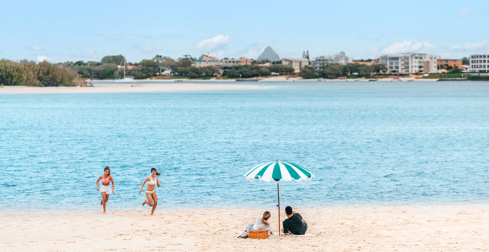 Family beach day at Bulock Beach Caloundra