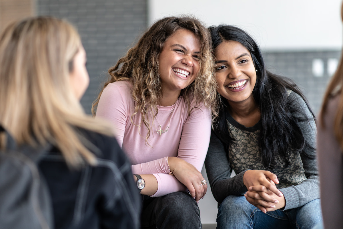 People laugh in a group