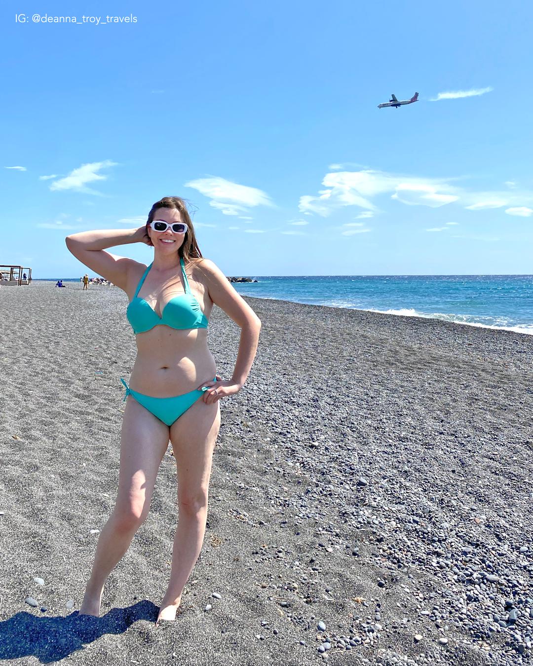 Perissa Black Sand Beach and plane