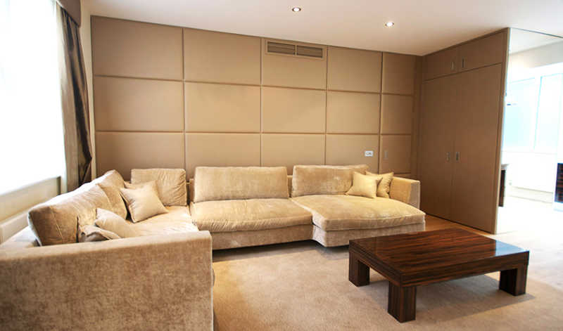 fabric-wall-padding-in-living-room