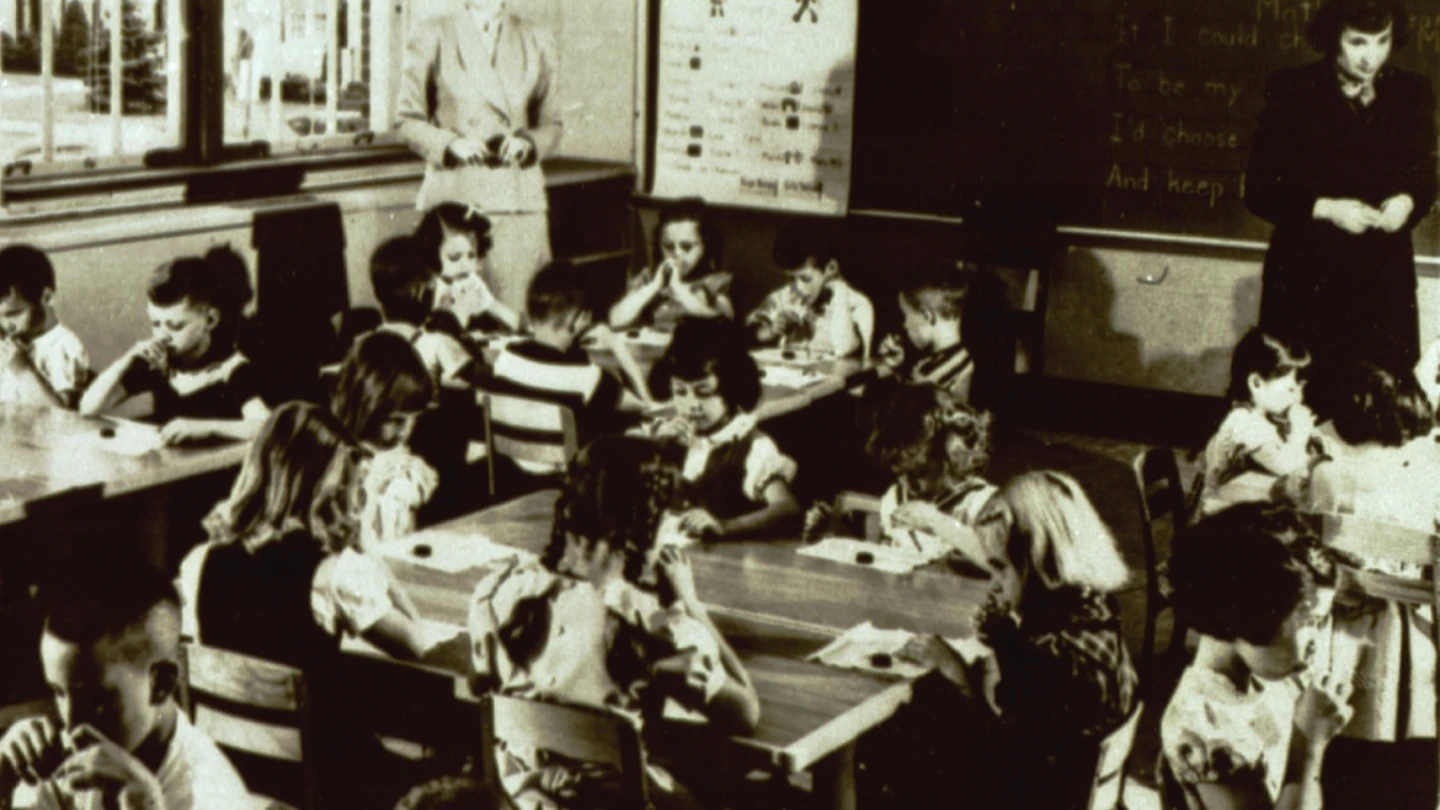 Vintage black and white photo of students in a classroom