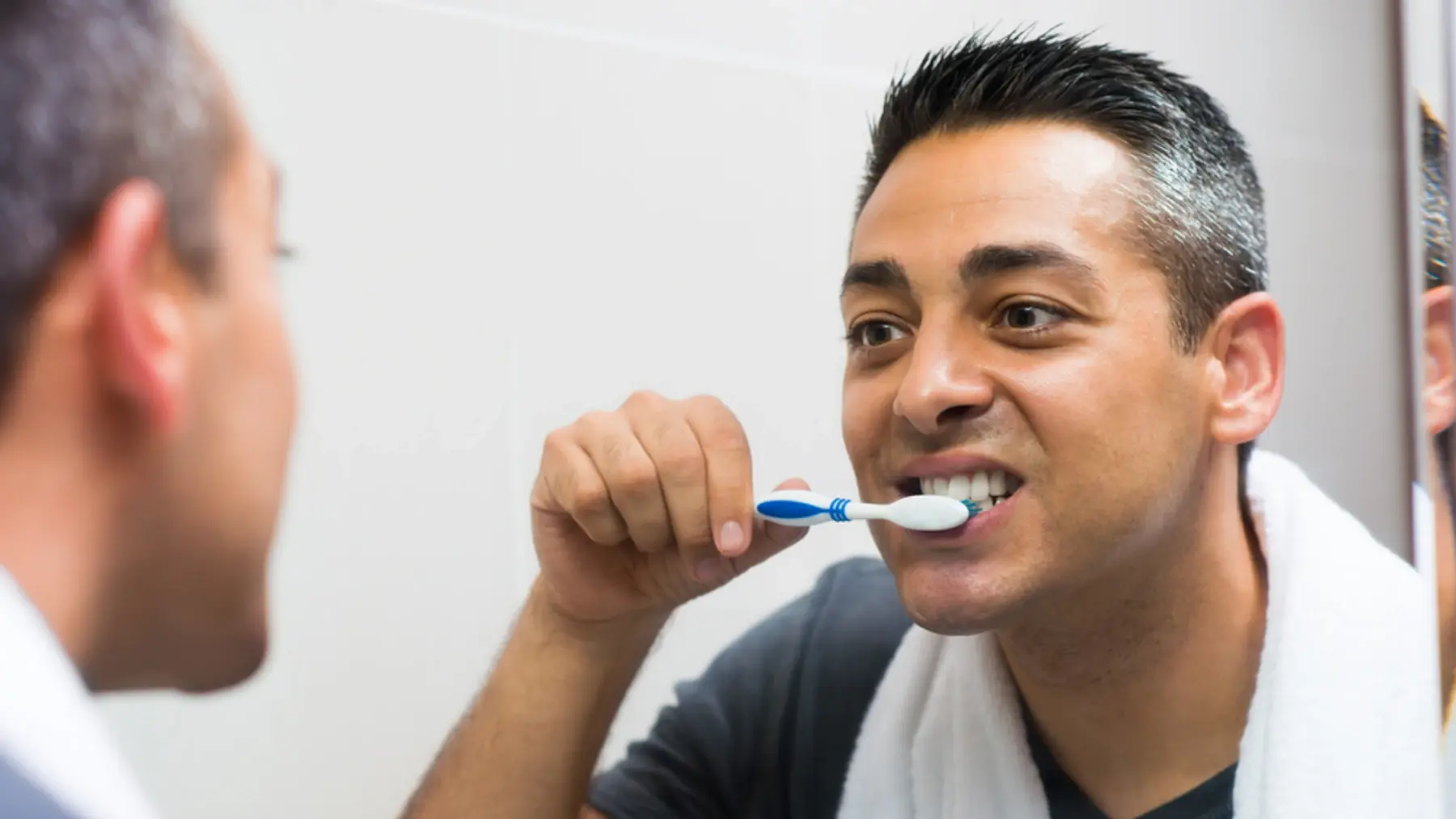 Man brushing his teeth