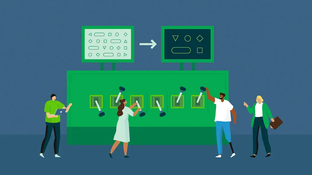 A group of engineers stand around a large machine flipping switches 
