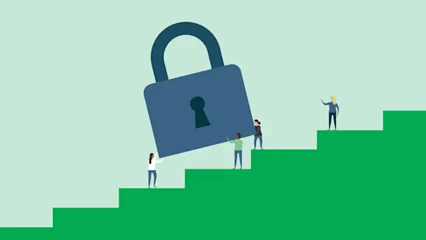 Workers raise an oversize security lock to higher and higher levels. 