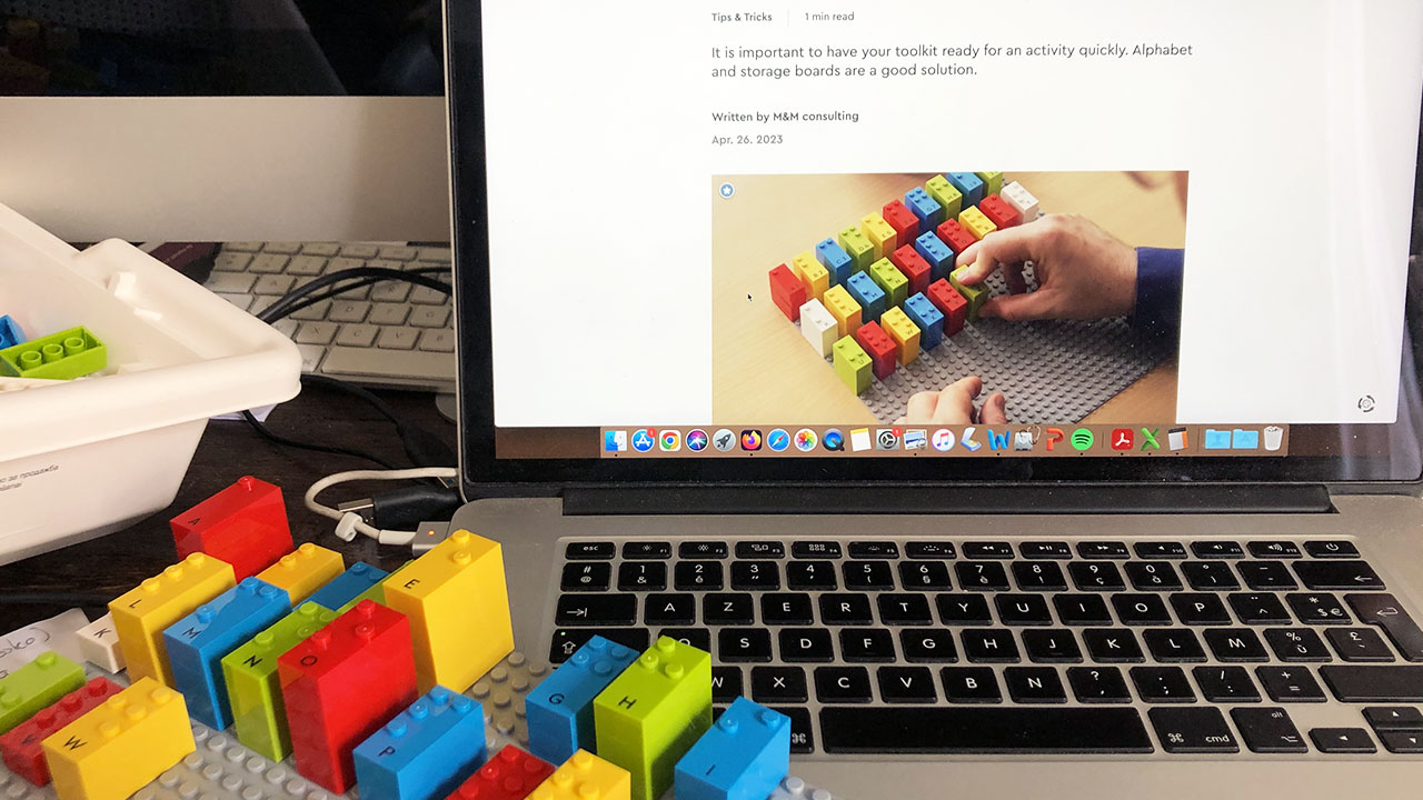 computer with baseplate and LEGO Braille Bricks