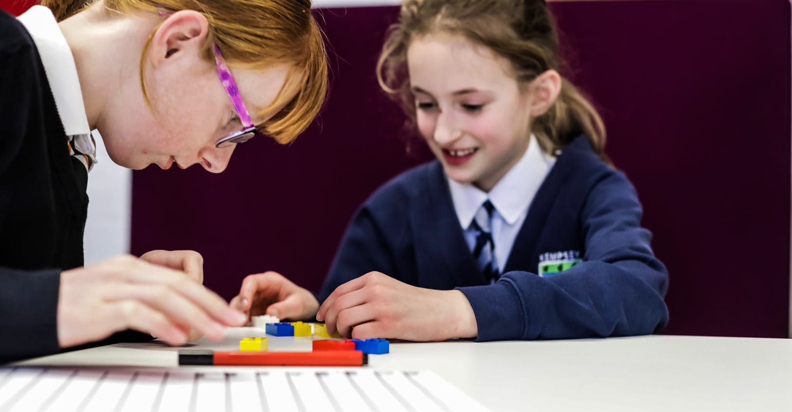 Children using LEGO Braille Bricks