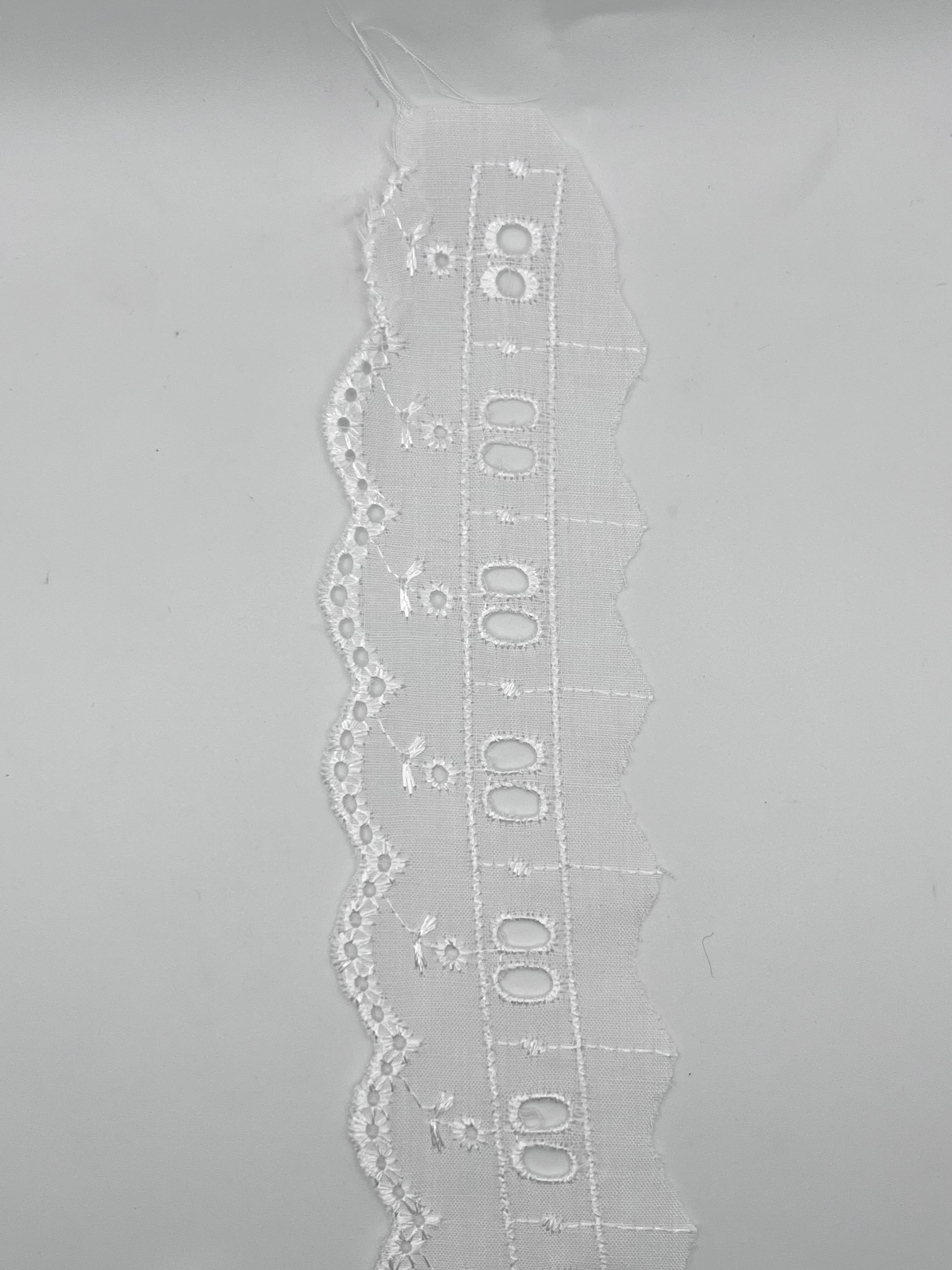 Tira bordada 2" metido