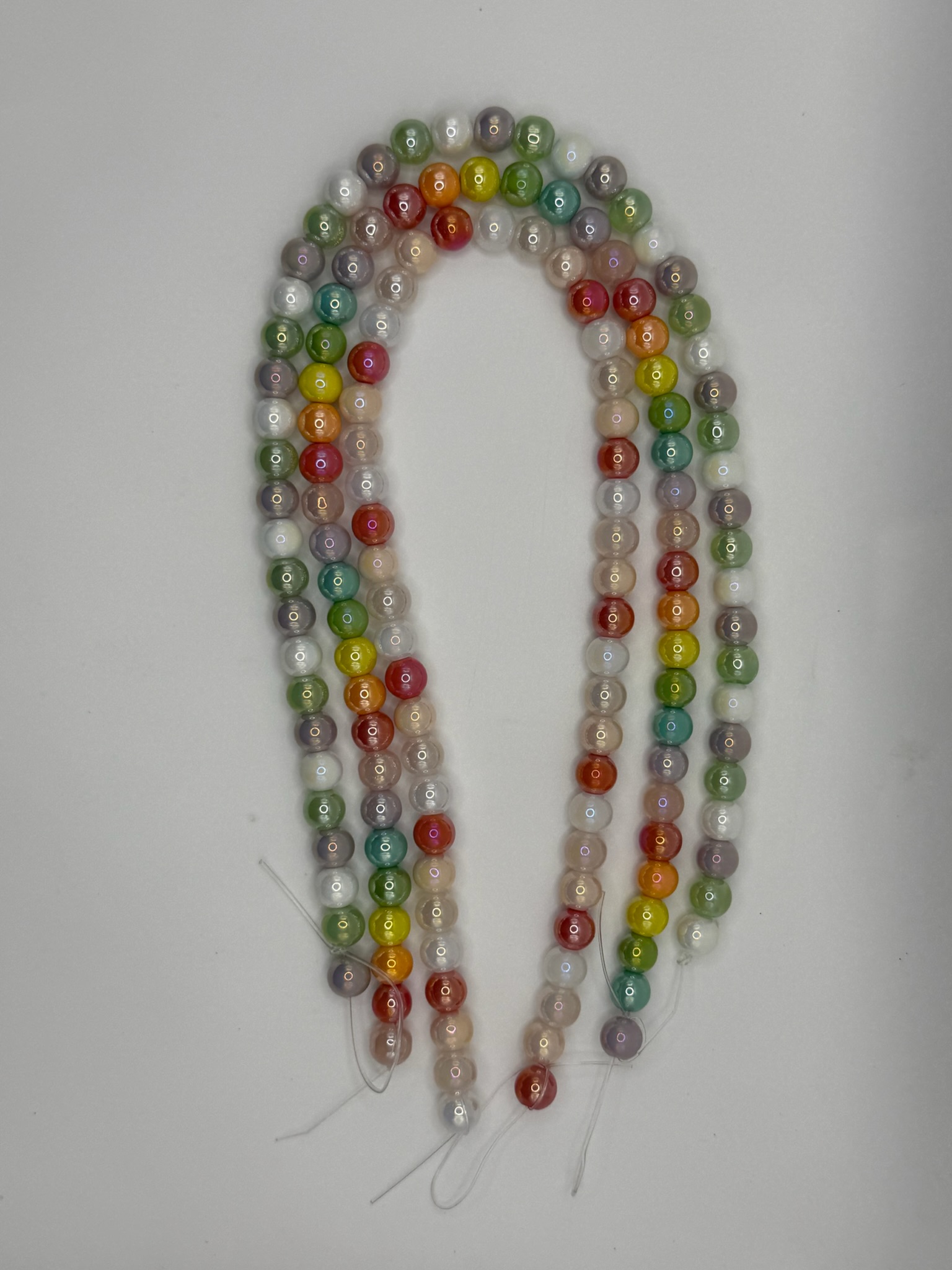 Perla multicolor brilloso (hilo)