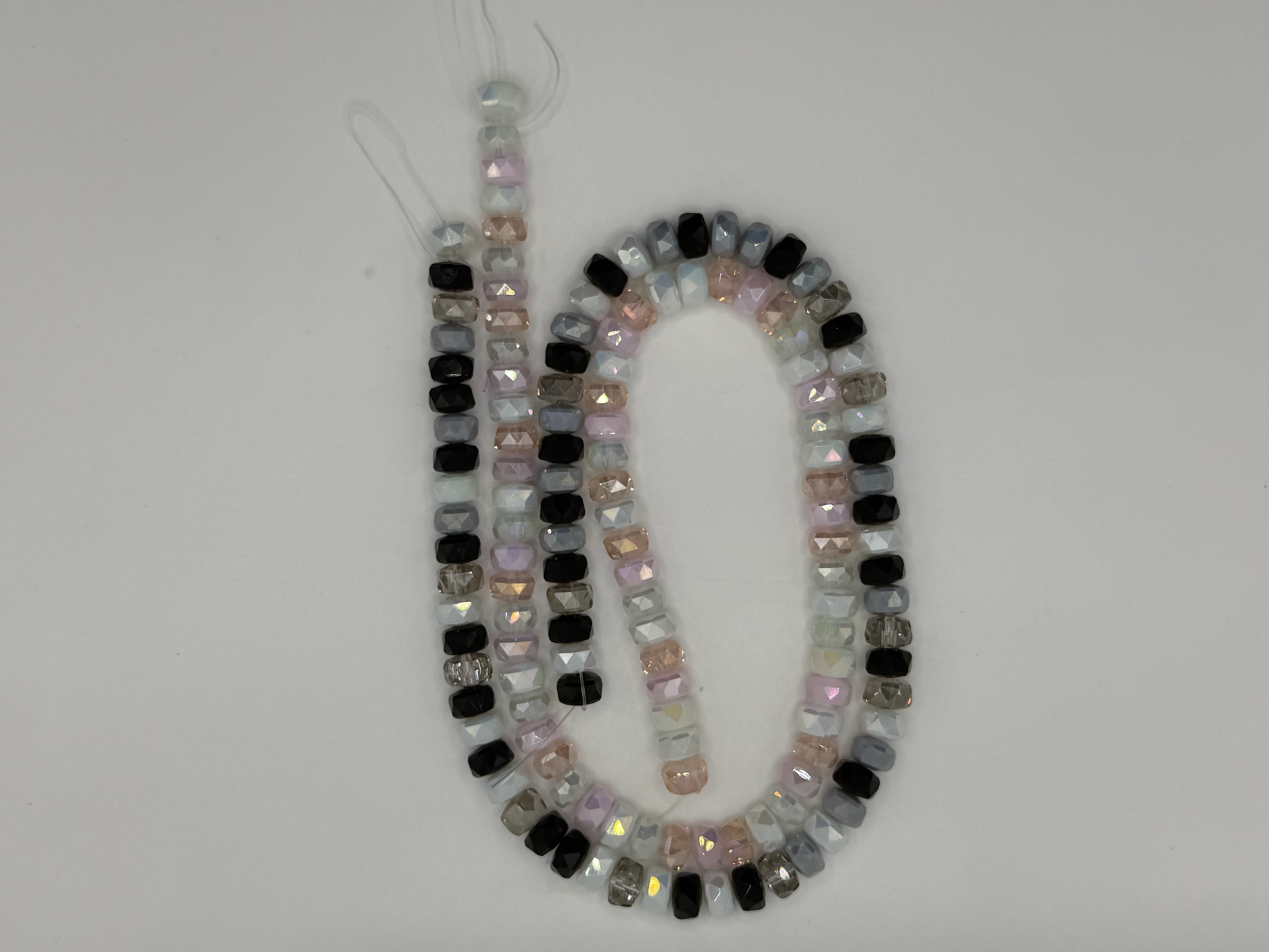 Cristal Donita rosa/negro (hilo)