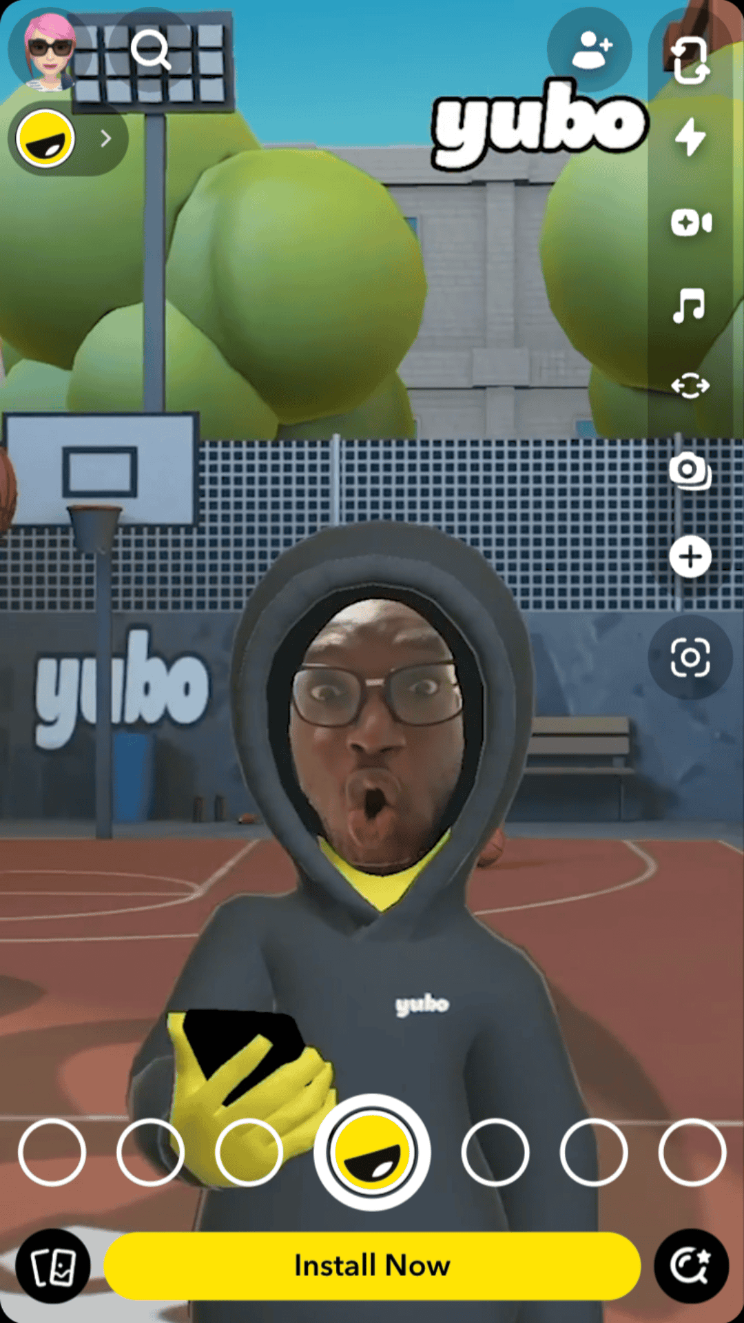 A Snapchat user tries on an AR Lens that places their face on a virtual avatar standing in an imaginary basketball court.