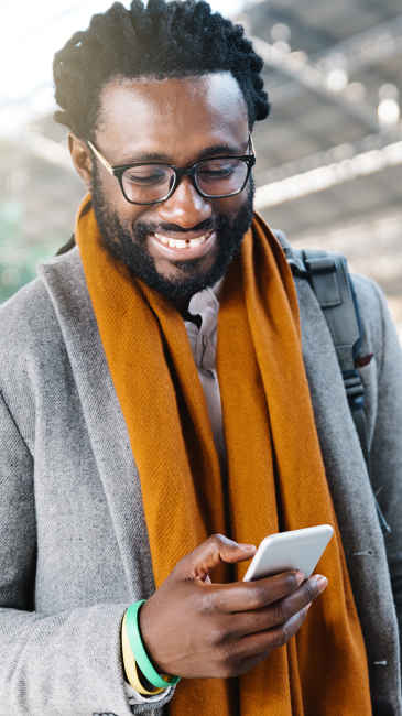 Man looking at his cell phone.