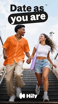 Hily “Date as you are” ad showing two people holding hands as they walk down steps.