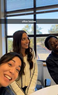 B2B professionals collaborating in office, reflecting modern marketing beyond traditional environments.