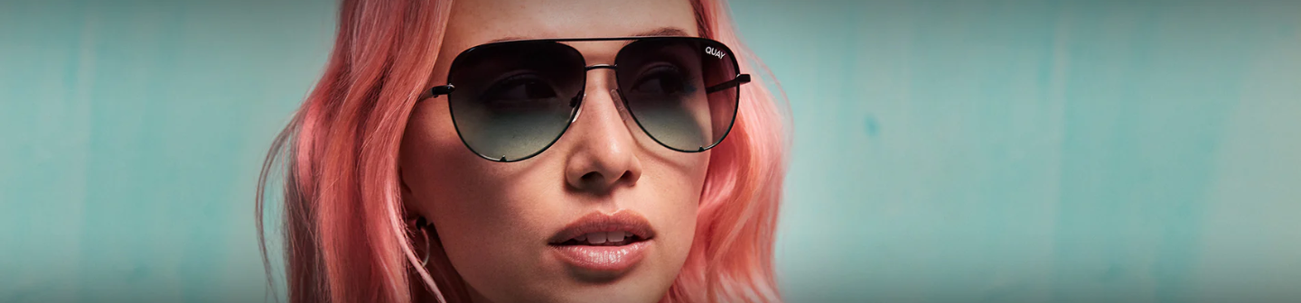 Model wearing Quay aviator sunglasses featured in Snapchat brand awareness ads creative.