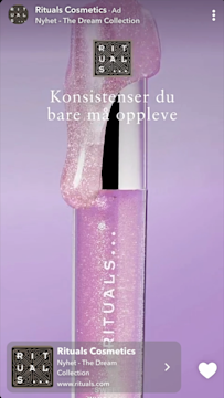 Snap Ad featuring a sparkly pink Rituals lip oil tube with shimmer dripping down against a lavender background.