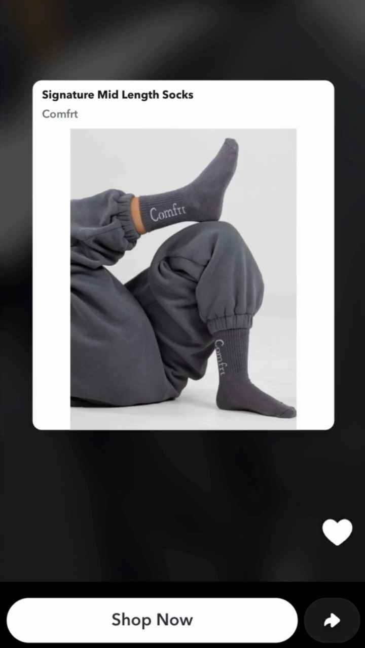 A Dynamic Product Ad on Snapchat featuring Comfrt’s signature midlength socks and a 'Shop Now' button.