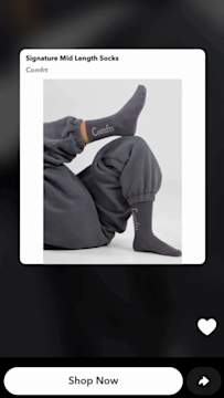 A Dynamic Product Ad on Snapchat featuring Comfrt’s signature midlength socks and a 'Shop Now' button.