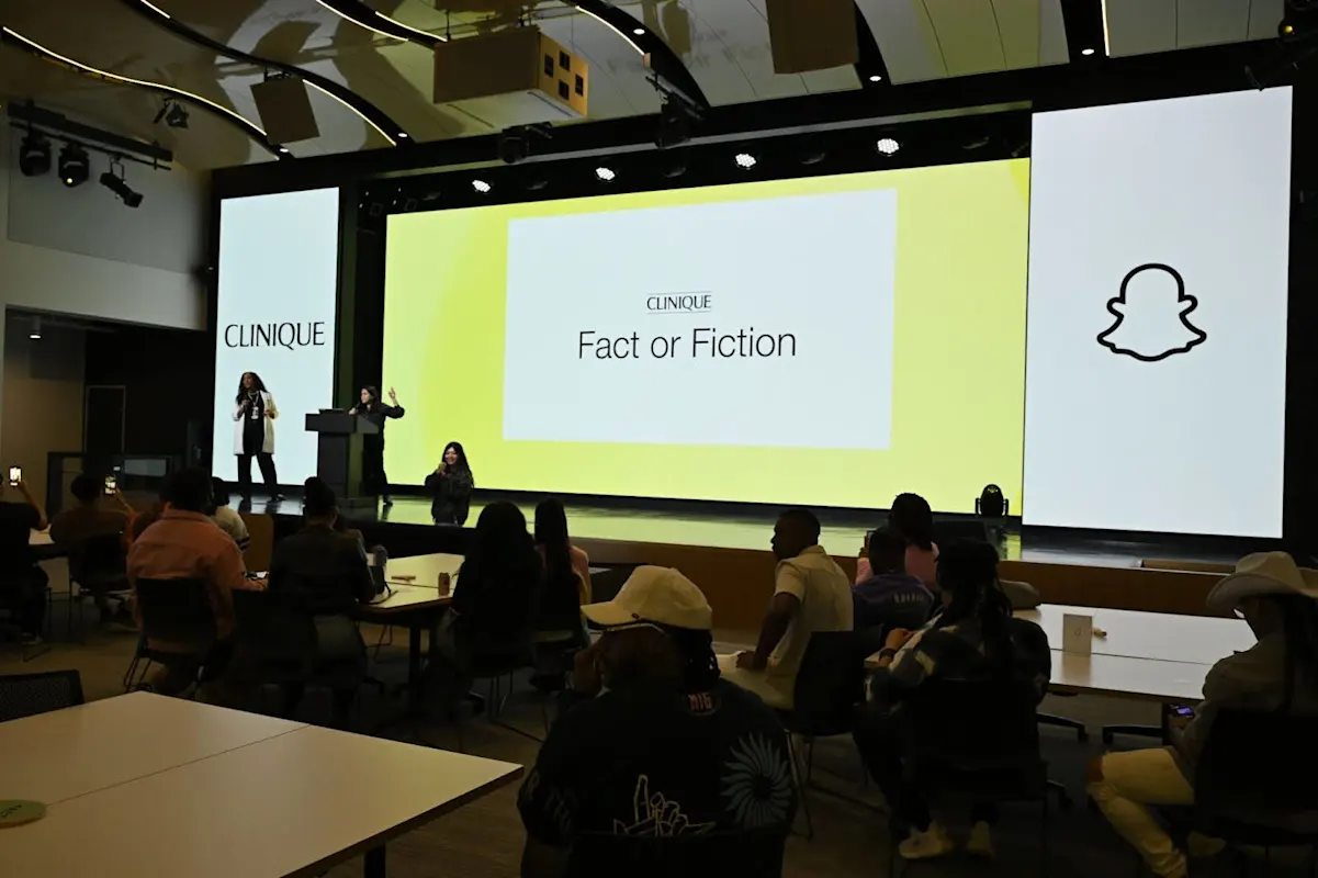 A presentation from Clinique with Snapchat featuring a slide that reads - Fact or Fiction