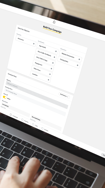Snapchat for Business's Build Your Campaign widget on a laptop screen