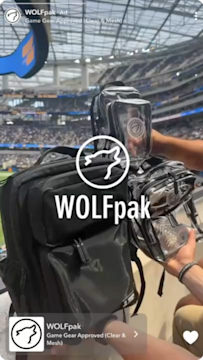 Clear stadium approved backpack with transparent compartments displayed at sports arena for mobile advertising.