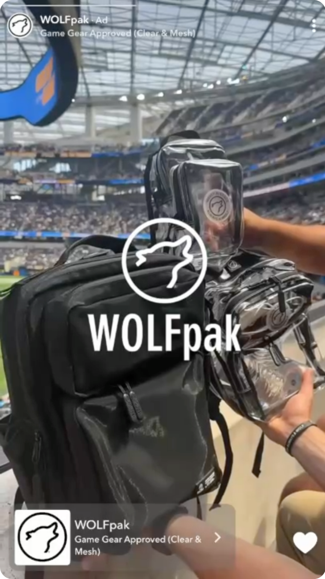 Clear stadium approved backpack with transparent compartments displayed at sports arena for mobile advertising.