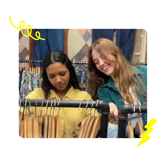 2 friends shopping for clothes