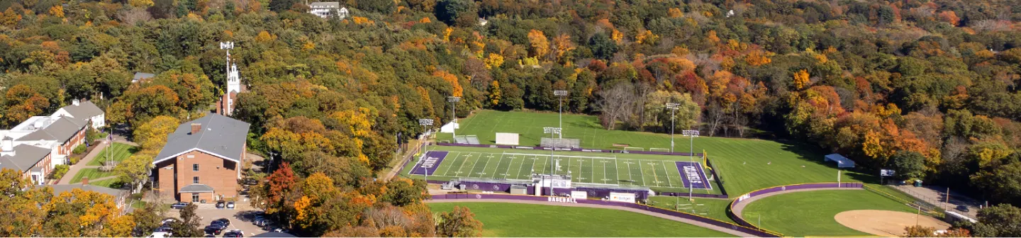 Photo of the Curry College campus, including sports fields.