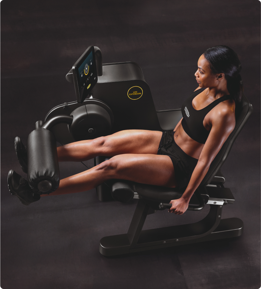 woman-technogym-leg-extension