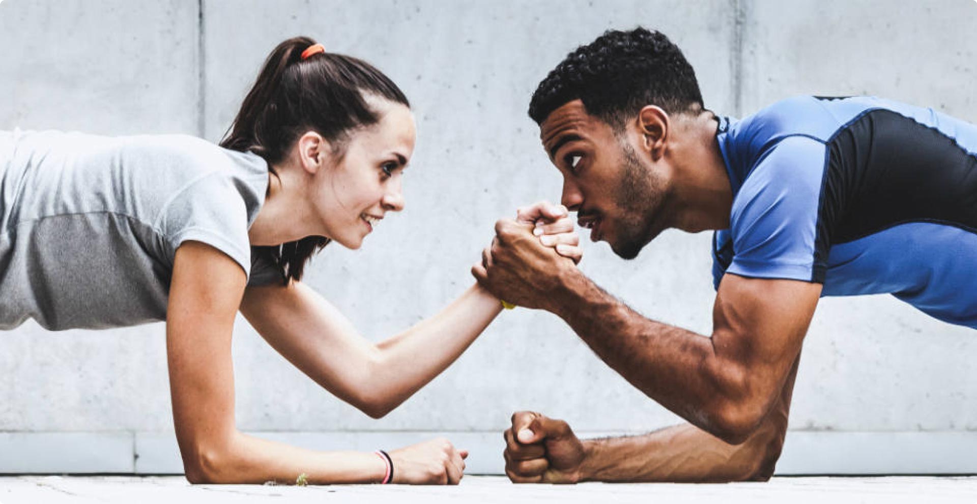 man-woman-arm-wrestling