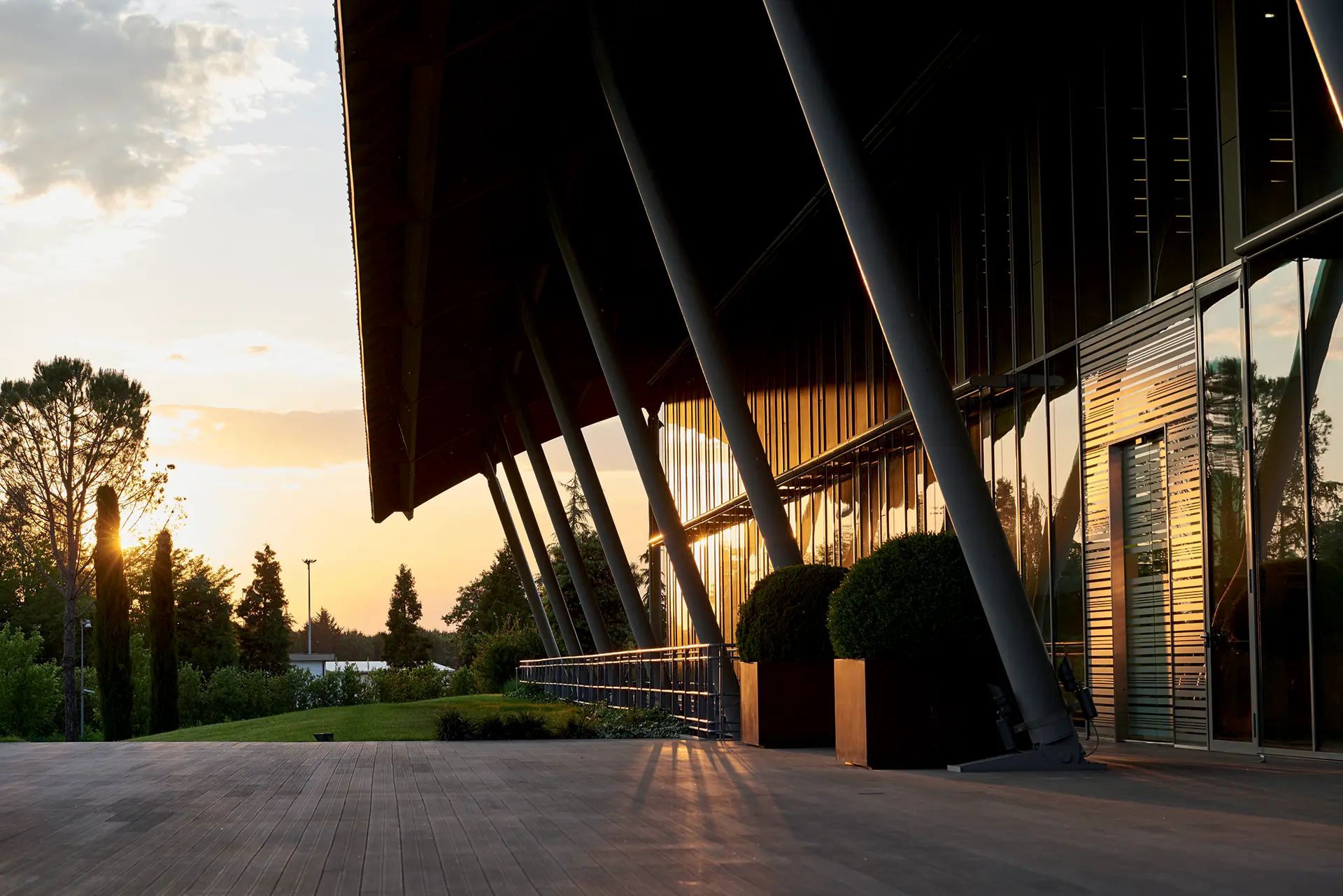 The Technogym Village building entrance at sunset