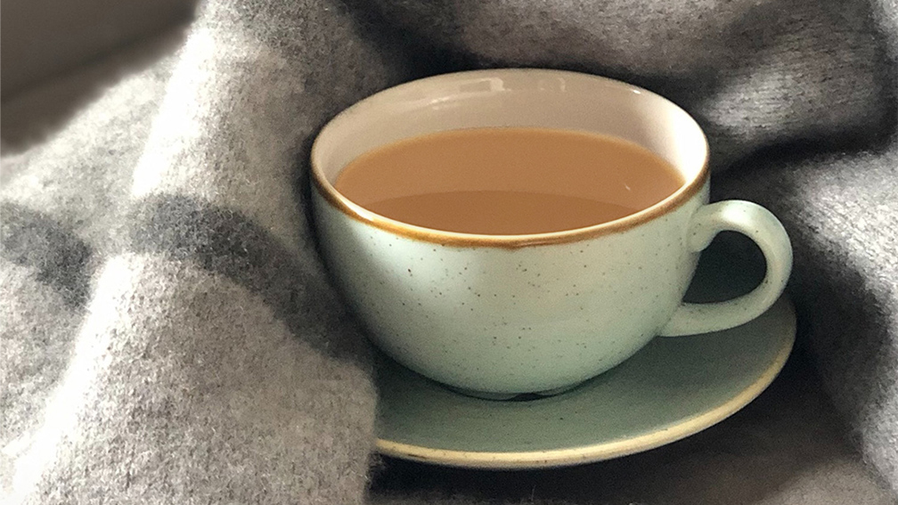Cup of tea with a blanket