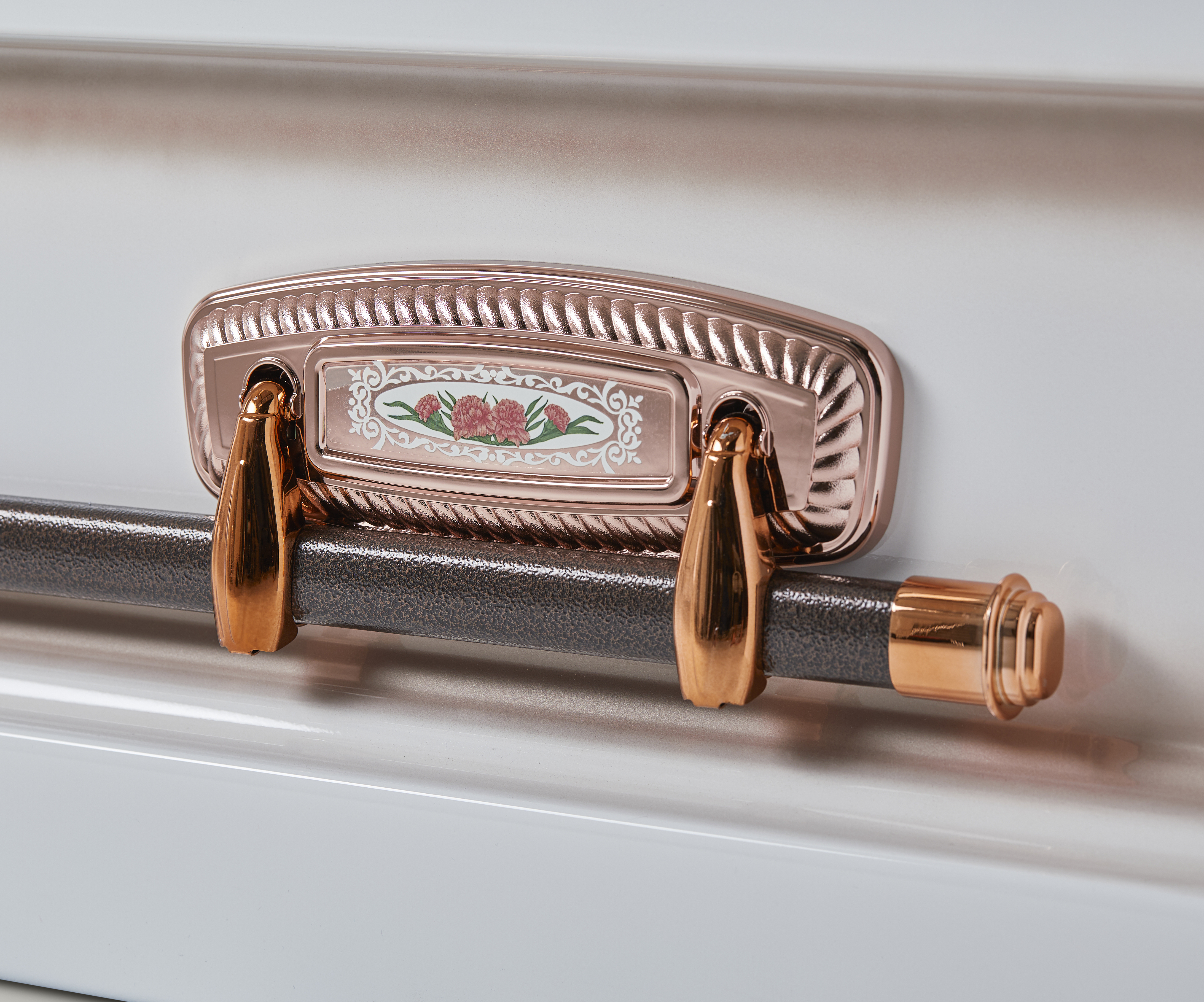 Detailed image of handle of White Rose Casket