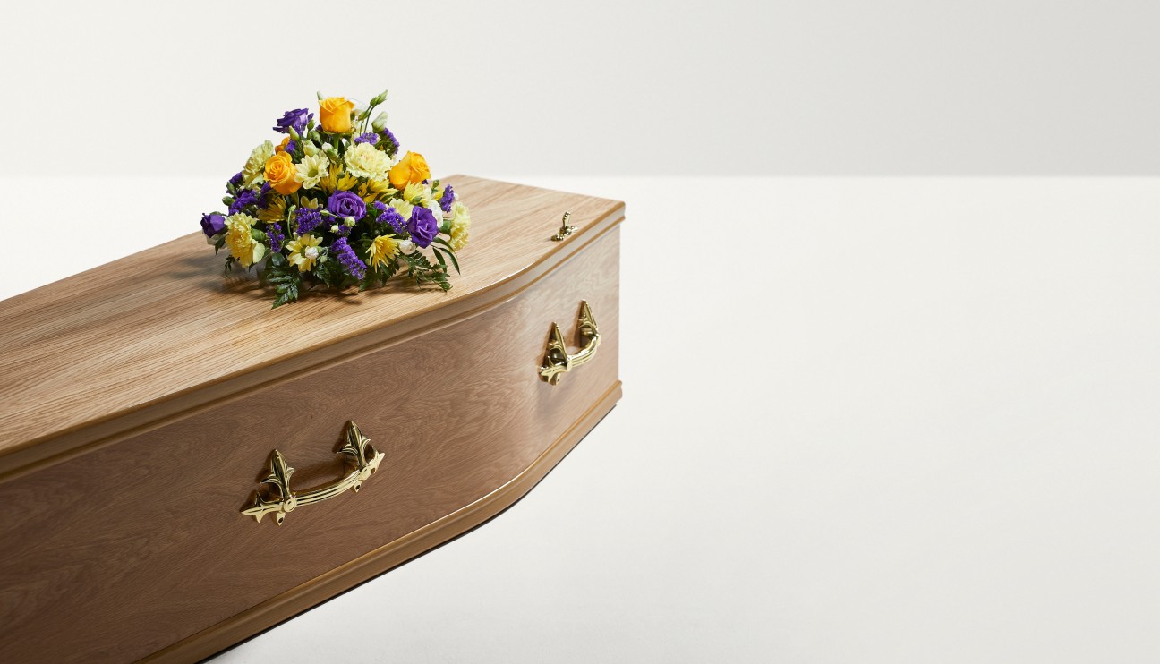 Traditional Mixed Posy on a coffin