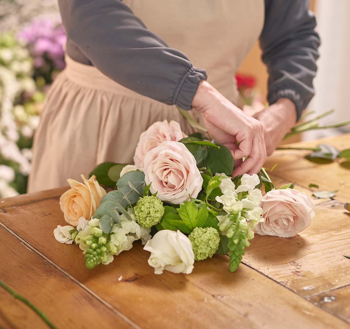 Florist preparing flowers