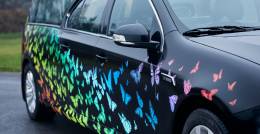 Close up image of butterfly rainbow hearse