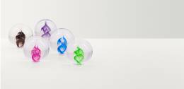 Five glass orbs with brightly coloured centres