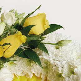 Zoomed in shot of yellow wreath of flowers