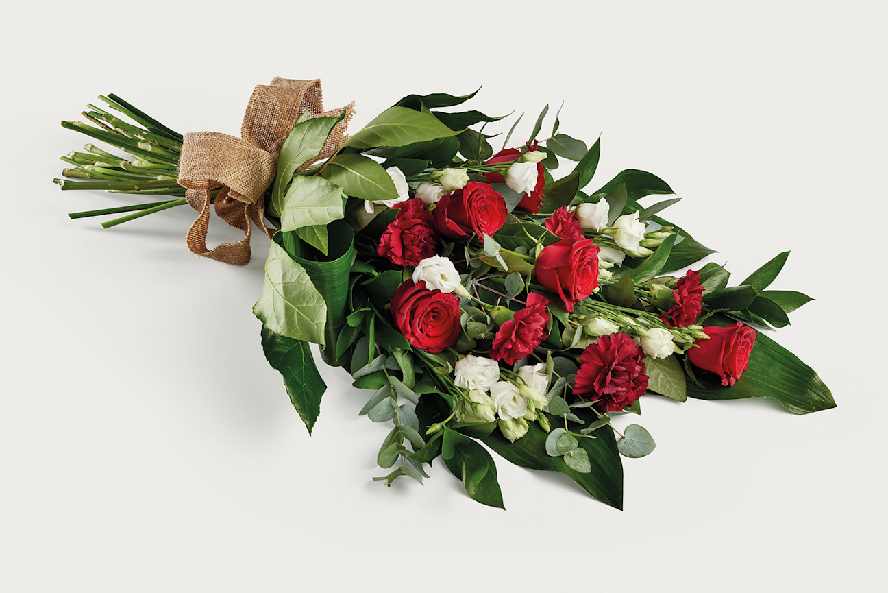 Red flowers with a hand-tied bow