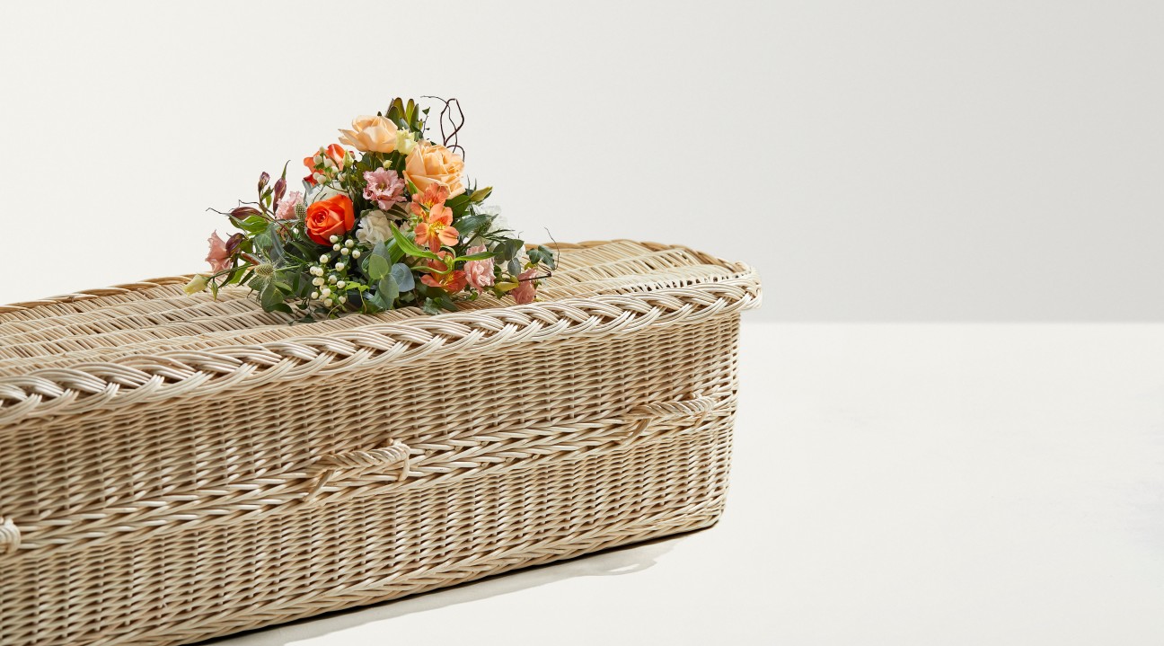 Natural mixed posy on a coffin