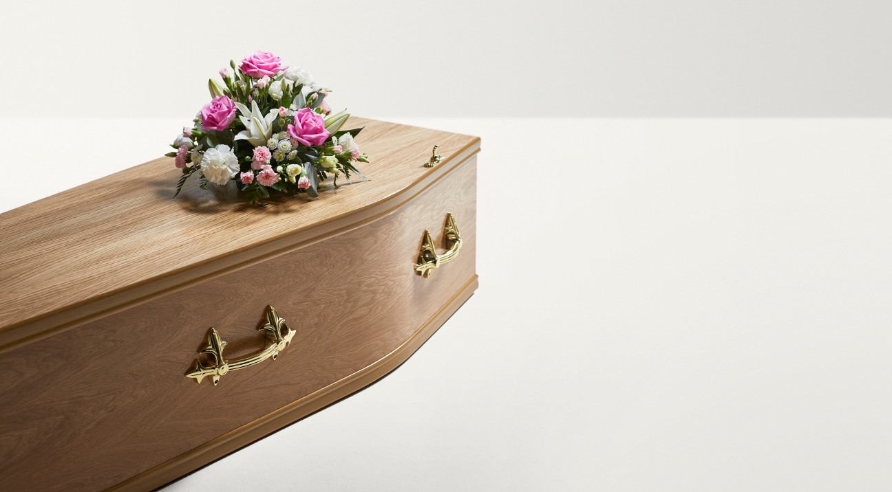 Classic Posy next to coffin