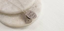 Silver pendant with handwriting inscription