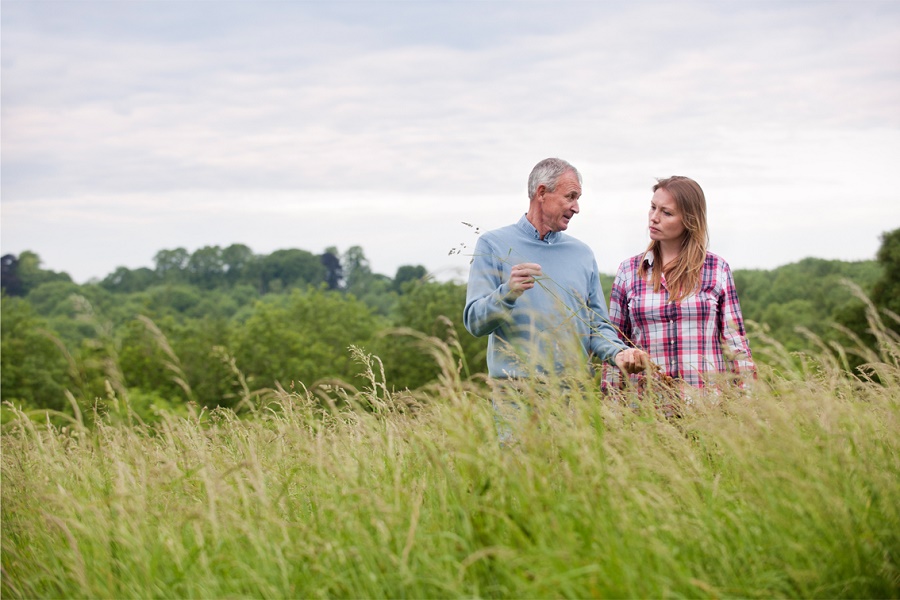 family-walk-field
