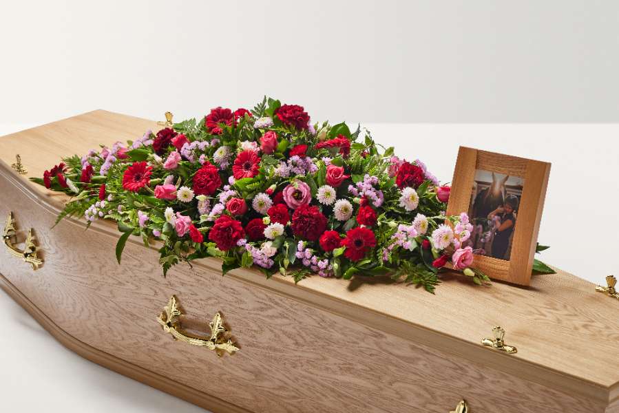 Photo frame with coffin spray 
