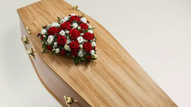 Elegant Heart flowers on a coffin