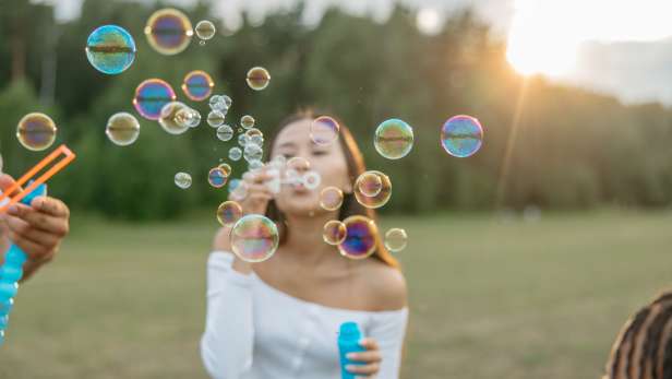pexels-anastasia-shuraeva-8943646 woman blowing bubbles