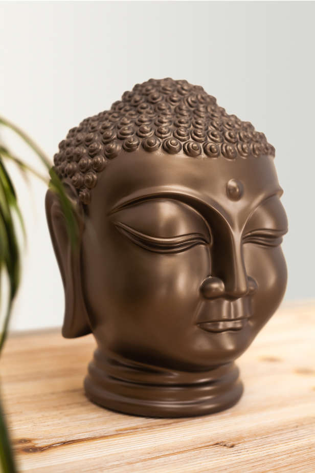 Buddha head urn
