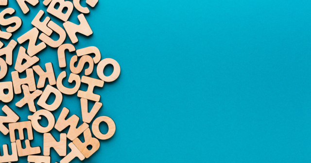 Wooden letters jumbled up representing aphasia