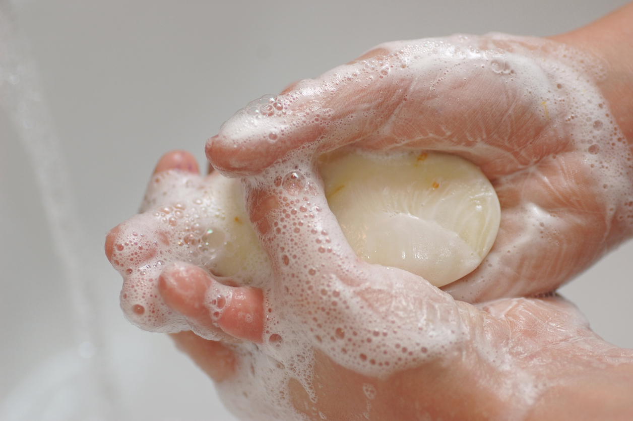 Washing hands with antibacterial soap