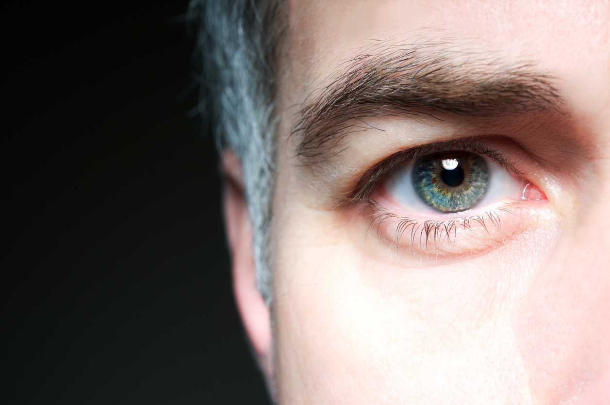A close up of a man' s eye